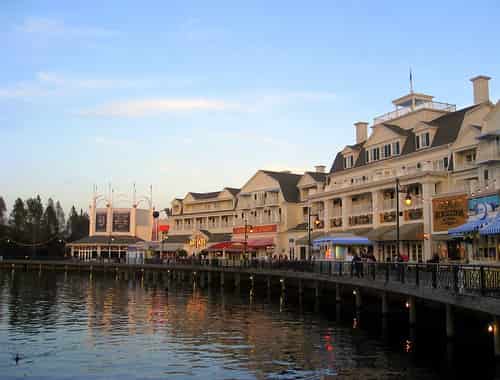 Charming view of Disney's Boardwalk Villas, a DVC resort, showcasing vibrant architecture and waterfront.
