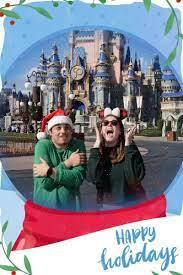 Cozy winter scene at a Disney DVC resort with snow-covered trees and festive decorations.