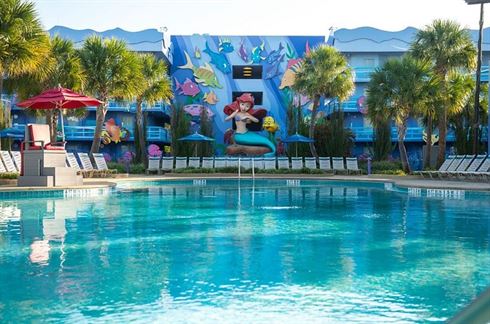 Colorful exterior of Disney's Art of Animation Resort showcasing vibrant character-themed architecture.
